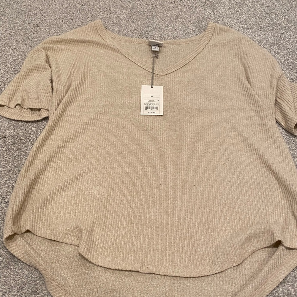 Tan sweater. Size medium